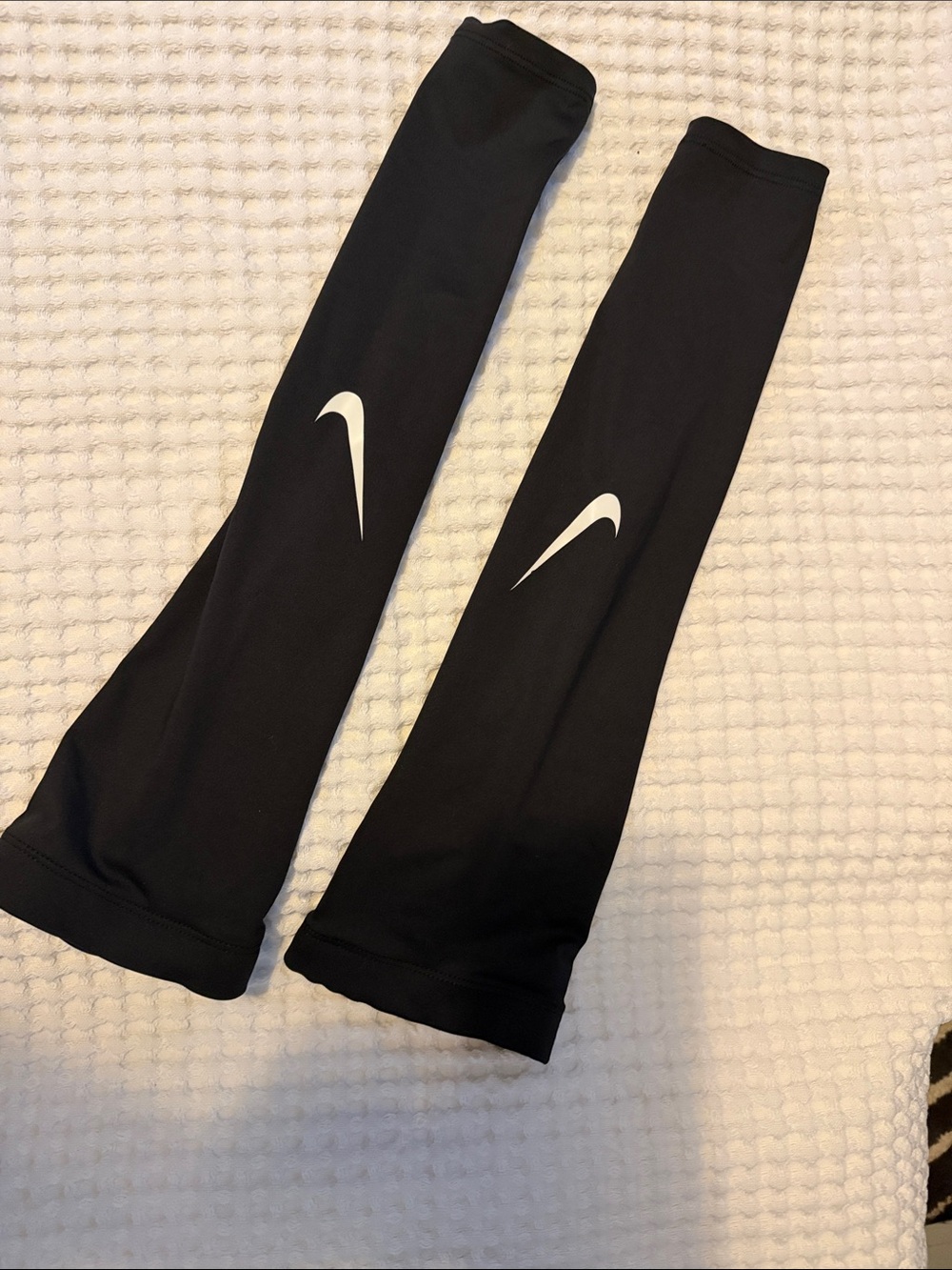 Nike Pro women’s volleyball arm sleeves with White Swoosh